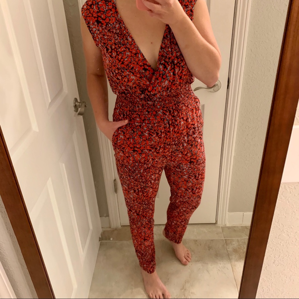 AQUA red, black, and blue pants jumpsuit
